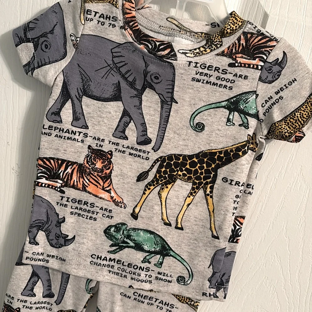 The Children's Place White and Blue Pajama Sets with Colorful Animal Print
